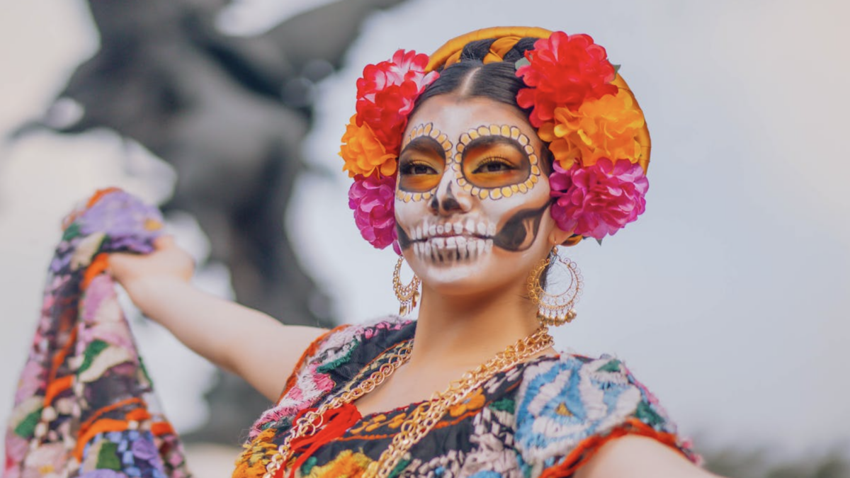 woman wearing day of the dead makeup